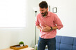 © AntonioDiaz - Pained man ready to go to the doctor