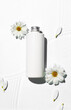 Bottle of cosmetic product and flowers on white background