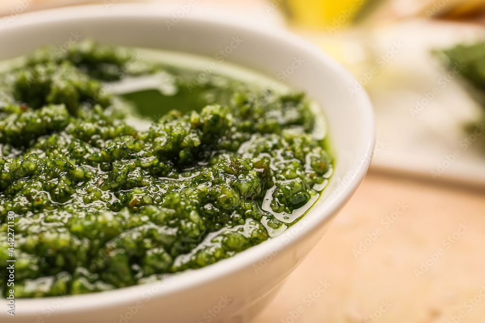 Bowl with fresh pesto sauce, closeup