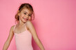 © Татьяна Добрикова - Attractive girl having fun on the pink background.