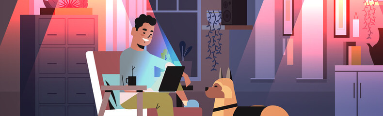 Poster - overworked businessman freelancer looking at laptop screen man with dog working in dark night home r