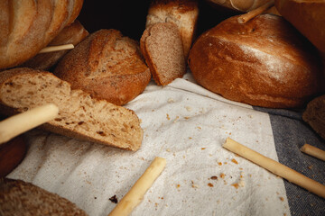 Variety of bread on tablecloth close up