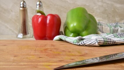 Poster - Yellow bell pepper being sliced and disappearing from the counter stop motion animation