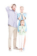© Mediaphotos - Vertical full length shot of modern man and woman standing with their little daughter astonished at something, white background