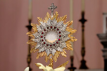 Monstrance (Ostensory) With The Blessed Sacrament (Eucharist) On The Altar Of The Church During Eucharistic Adoration. The Host Bears The Inscription JHS, Monogram Of The Name Of Jesus