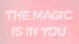 THE MAGIC IS IN YOU neon phrase typography on a pink background