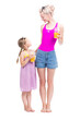 © Mediaphotos - Vertical full length studio portrait of modern Caucasian woman and girl wearing summer clothes standing together drinking fresh orange juice