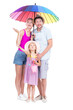 © Mediaphotos - Vertical full length studio portrait of family with one little daughter wearing summer outfits spending time on vacation, white background