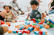 © Rawpixel.com - Diverse children enjoying playing with toys