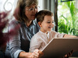 © Rawpixel.com - Grandmother Grandson Family Reading Leisure