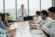 © Me studio - group of business people meeting and discussing a project at meeting room.
