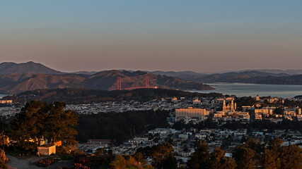 Wall Mural - Early morning sun rising on San Francisco, Ca. the city on the bay beautiful view