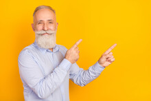 Photo Of Charming Attractive Old Businessman Point Fingers Empty Space Smile Isolated On Yellow Color Background