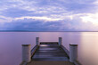 © Austockphoto - Wharf on lake early morning at sunrise