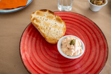 Wall Mural - Toast with cheese sauce, a traditional starter in a Greek restaurant. Paros island, Greece