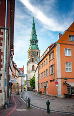 HANNOVER, GERMANY. JUNE 19, 2021. Beautiful view to a tower with a clock from Ballhofplatz