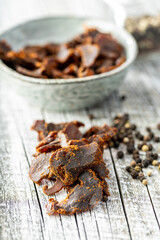 Canvas Print - Sliced beef jerky. Dried beef meat.