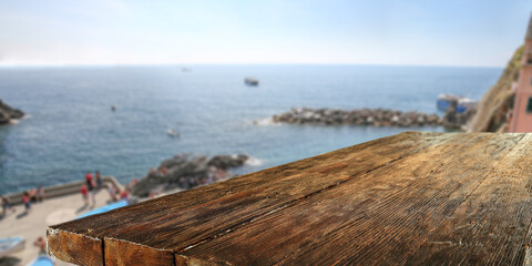 Poster - Summer background of wooden desk and landscape of Italy 