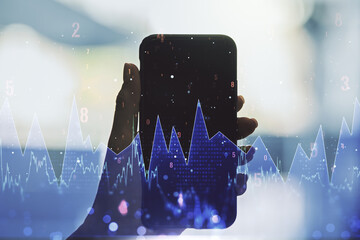 Poster - Abstract creative analytics data spreadsheet and hand with mobile phone on background, analytics and analysis concept. Multiexposure