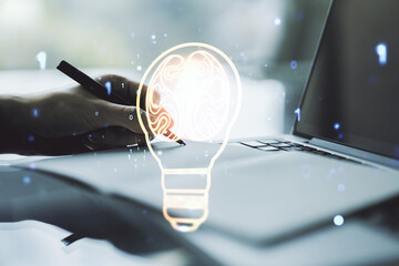 Poster - Creative idea concept with light bulb and human brain illustration and with hand writing in notebook on background with laptop. Neural networks and machine learning concept. Multiexposure