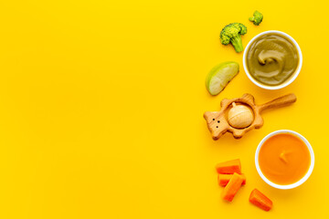 Baby feeding with fruits food and fresh vegetables, top view