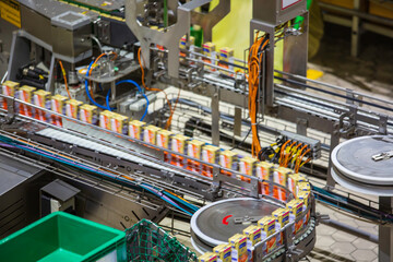 Wall Mural - Roller conveyor pack up of flowing milk