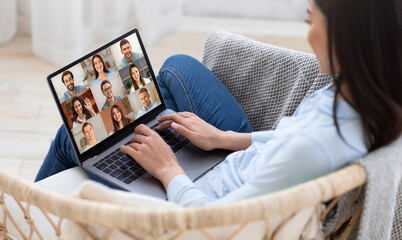 Poster - Online Communication. Woman Sitting In Chair With Laptop, Having Group Video Chat