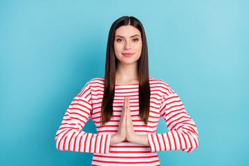 Canvas Print - Portrait of attractive focused calm girl asking favor gift request isolated over bright blue color background