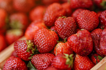 Poster - Fresh ripe strawberries displayed on market, closeup detail