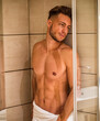 © theartofphoto - Naked Athletic Man Taking Shower at the Bathroom