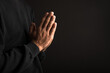 © Daniel - prayer man on dark background
