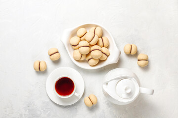 Baci di dama homemade Italian hazelnut biscuits cookies with chocolate.