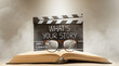 what's your story, text title on the film slate, and eyeglasses on top of the old book