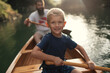 © yossarian6 - Young boy paddling canoe on the lake with his dad