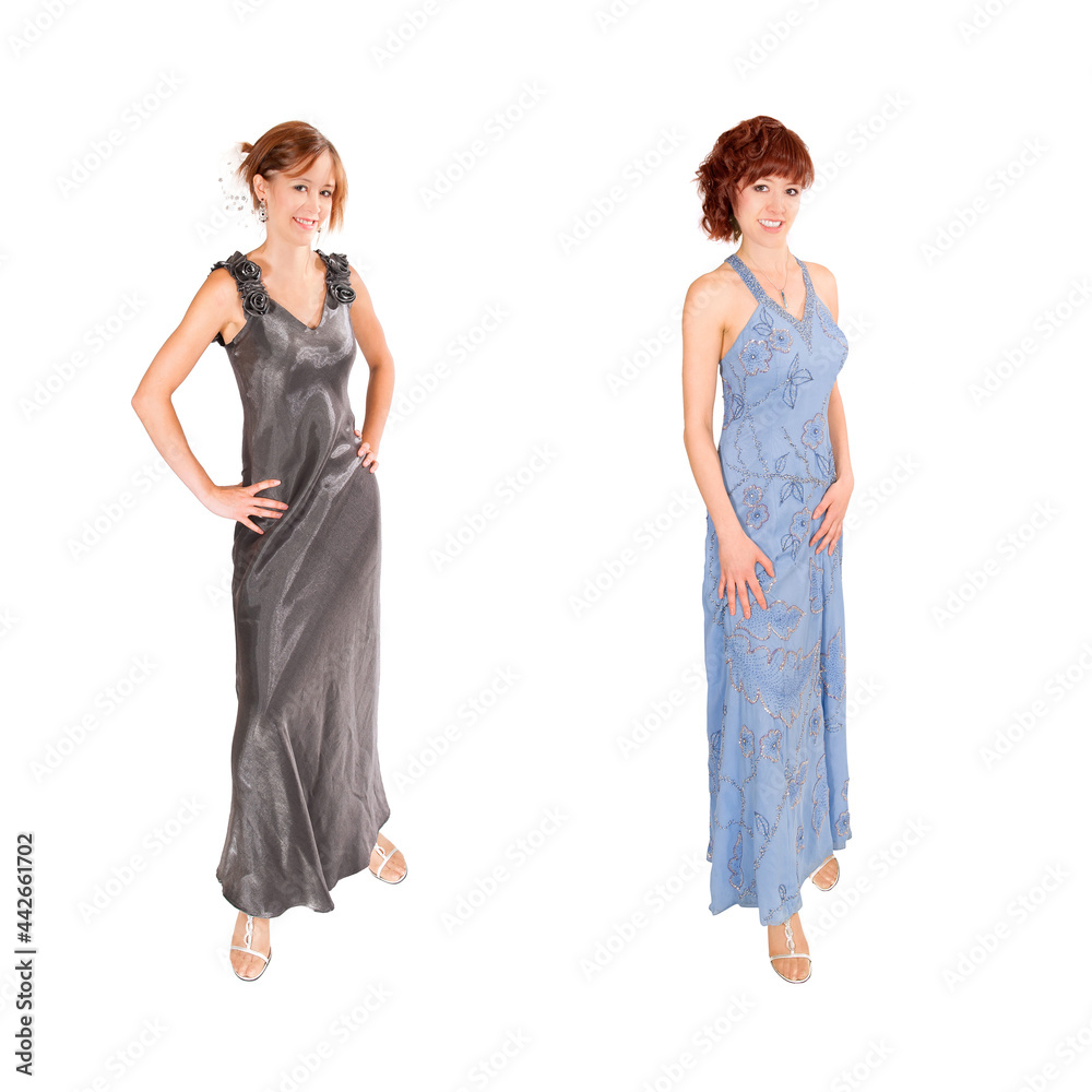 Beautiful young woman wearing two elegant evening dresses, isolated in ...