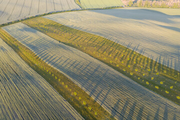 Poster - Dramatic sunset over the agricultural landscape
Aerial shot, countryside landscape during summer or spring time. Fields and meadows in Moravia, Czech republic.
Sunset time