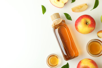 Wall Mural - Homemade apple vinegar and ingredients on white background