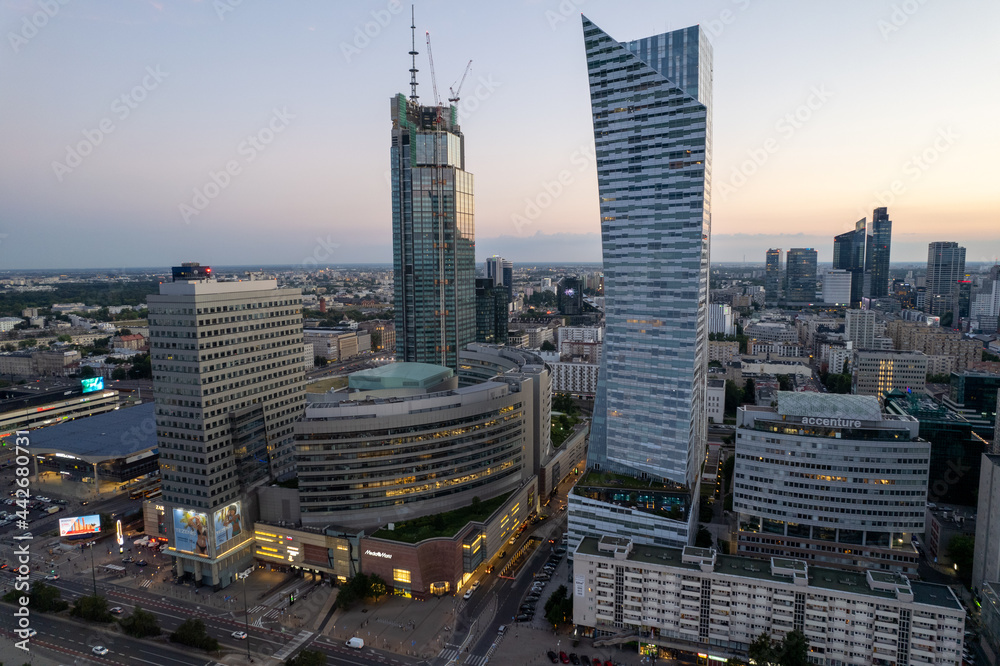 Warszawa - centrum miasta, zachód słońca, wieżowce widziane z drona - obrazy, fototapety, plakaty 