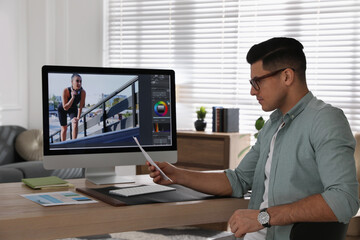 Poster - Professional retoucher working on computer in office