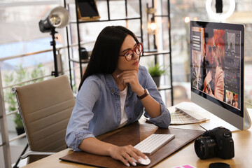 Canvas Print - Professional retoucher working on computer in office