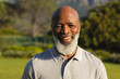 © wavebreak3 - Portrait of smiling senior african american man in stunning countryside