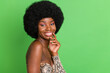© deagreez - Photo of charming pretty afro american young woman hold hand face smile nice isolated on green color background
