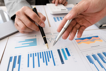 Fototapete - Business casual team are presenting and discussing company growth project success financial statistics, professional investor working start up project for strategy plan with document