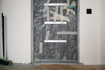 door protected with cellophane film