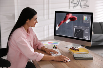Poster - Professional retoucher working on computer in office