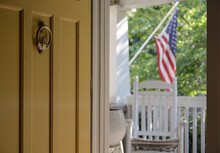 Front Door Entrance With American Flag