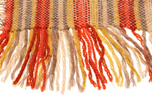 Fringed Edge Of A Small Handmade Rug Or Mat, Woven From Red And Yellow Wool Threads, One Object Close-up