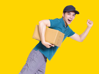 young delivery man run quickly and holding the parcel box