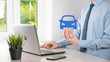 © Ivan - Digital composite of Man holding car icon.Car automobile insurance and car services concept. Businessman with offering gesture and icon of car