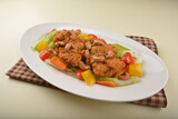 Fototapeta Kuchnia - deep fried chicken cutlet chop with cashew nut and vegetables main course asian halal menu